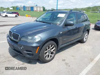 2011 BMW X5 35i with VIN 5UXZV4C57BL739907, listed as a IAAI auction lot 42135572 with 0 mi miles. Bid and sale history available at carsss.com. Image 2.