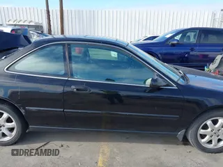 1998 Acura CL Premium z VIN 19UYA2258WL011745, wystawiony jako IAAI lot #41906267 z przebiegiem 296 614 mil mil oraz . Historia ofert i sprzedaży dostępna na DreamBid. Obrazek 13.