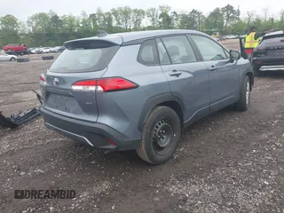 2022 Toyota Corolla Cross L with VIN 7MUAAABG0NV024424, listed as a IAAI auction lot 42261227 with 20,171 mi miles and . Bid and sale history available at DreamBid. Image 4.