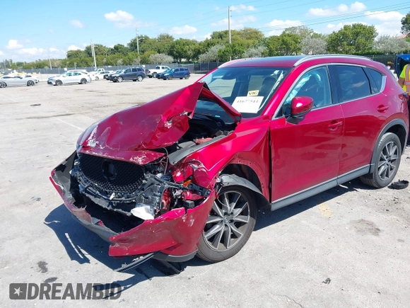 2018 Mazda CX-5 Grand Touring with VIN JM3KFADM0J0377091, listed as a IAAI auction lot 41677544 with 91,758 mi miles. Bid and sale history available at carsss.com. Image 18.