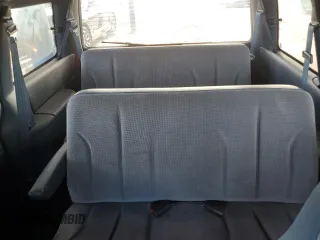 1993 Plymouth Voyager z VIN 2P4GH25K1PR283274, wystawiony jako Copart lot #79144394 z przebiegiem 105 890 mil mil oraz Tytuł czysty. Historia ofert i sprzedaży dostępna na DreamBid. Obrazek 10.