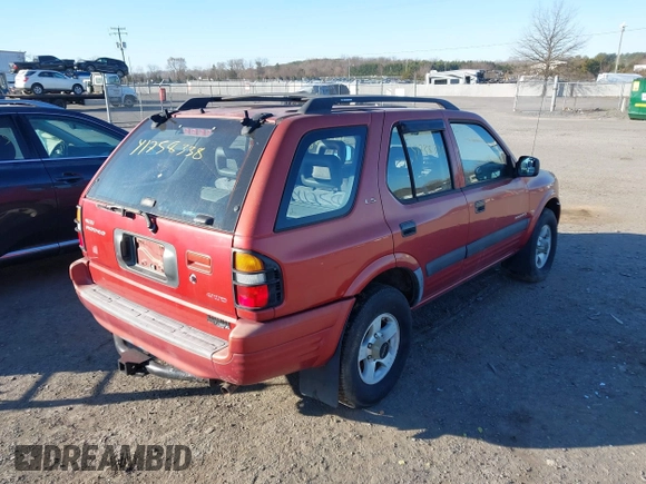 1999 Isuzu Rodeo S with VIN 4S2CM58W6X4336332, listed as a IAAI auction lot 41758338 with 183,983 mi miles. Bid and sale history available at carsss.com. Image 4.