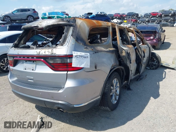 2018 Dodge Durango SXT with VIN 1C4RDHAG4JC290314, listed as a IAAI auction lot 42395669 with Not provided miles and . Bid and sale history available at DreamBid. Image 4.