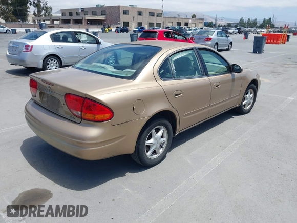 1999 Oldsmobile Alero GL z VIN 1G3NL52T1XC384073, wystawiony jako IAAI lot #42359330 z przebiegiem 177 869 mil mil oraz . Historia ofert i sprzedaży dostępna na DreamBid. Obrazek 4.