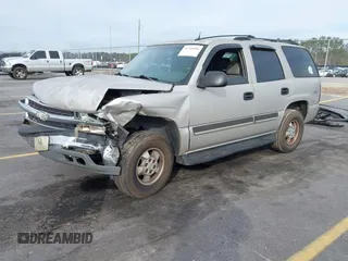 2004 Chevrolet Tahoe LT z VIN 1GNEC13Z34J258811, wystawiony jako IAAI lot #41710156 z przebiegiem 322 462 mil mil oraz . Historia ofert i sprzedaży dostępna na DreamBid. Obrazek 2.