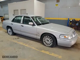 2011 Mercury Grand Marquis LS with VIN 2MEBM7FV5BX603862, listed as a Copart auction lot 85744834 with 98,644 mi miles and Salvage Title. Bid and sale history available at carsss.com. Image 4.