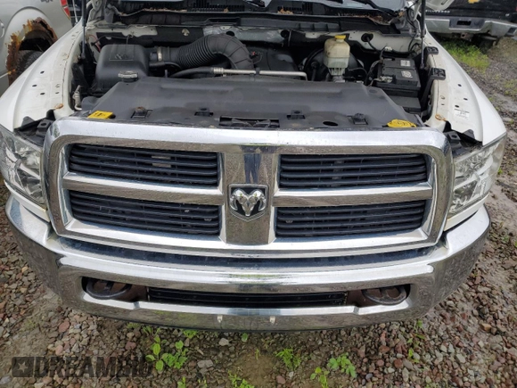 2012 Ram 2500 ST z VIN 3C6TD5CT2CG331318, wystawiony jako Copart lot #55439295 z przebiegiem 296 040 mil mil oraz Czysty tytuł • Clean title. Historia ofert i sprzedaży dostępna na DreamBid. Obrazek 11.