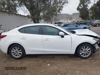 2015 Mazda 3 i Touring with VIN 3MZBM1V70FM231234, listed as a IAAI auction lot 42007526 with 114,255 mi miles. Bid and sale history available at carsss.com. Image 12.