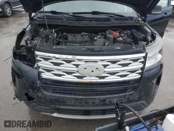 2018 Ford Explorer XLT z VIN 1FM5K8D87JGC55926, wystawiony jako Copart lot #57033875 z przebiegiem 197 354 mil mil oraz Szkoda całkowita • Salvage title. Historia ofert i sprzedaży dostępna na DreamBid. Obrazek 11.