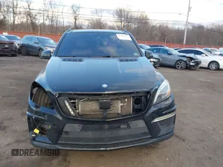 2014 Mercedes-Benz M 63 AMG z VIN 4JGDA7EBXEA306024, wystawiony jako IAAI lot #41452811 z przebiegiem 98 510 mil mil oraz . Historia ofert i sprzedaży dostępna na DreamBid. Obrazek 12.