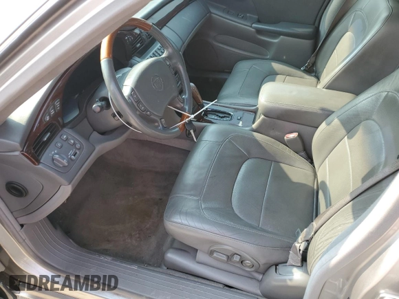 2004 Cadillac DeVille DTS z VIN 1G6KF57984U188454, wystawiony jako Copart lot #62397494 z przebiegiem 142 060 mil mil oraz Szkoda całkowita • Salvage title. Historia ofert i sprzedaży dostępna na DreamBid. Obrazek 7.