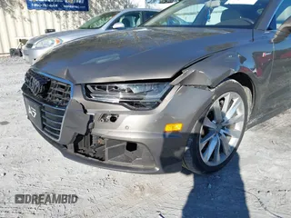 2016 Audi A7 3.0 Premium Plus with VIN WAUWGAFC2GN105498, listed as a IAAI auction lot 41488062 with 120,393 mi miles. Bid and sale history available at carsss.com. Image 6.