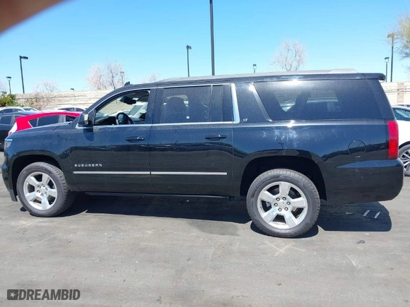 2015 Chevrolet Suburban LT with VIN 1GNSCJKC5FR526259, listed as a IAAI auction lot 41849566 with NaN miles. Bid and sale history available at carsss.com. Image 14.
