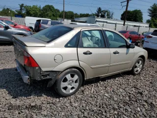 2006 Ford Focus S z VIN 1FAFP34N96W111431, wystawiony jako Copart lot #59478815 z przebiegiem Nie podano mil oraz Szkoda całkowita • Salvage title. Historia ofert i sprzedaży dostępna na DreamBid. Obrazek 3.