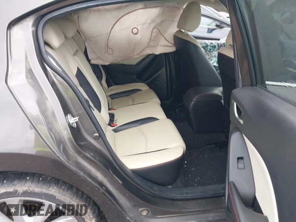 2016 Mazda 3 S Grand Touring z VIN JM1BM1N33G1277798, wystawiony jako IAAI lot #42337611 z przebiegiem 91 519 mil mil oraz . Historia ofert i sprzedaży dostępna na DreamBid. Obrazek 8.