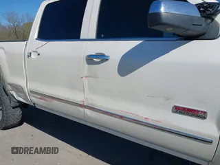 2014 GMC Sierra 1500 SLT with VIN 3GTU2VEC0EG208569, listed as a IAAI auction lot 41834893 with 128,731 mi miles and . Bid and sale history available at DreamBid. Image 6.