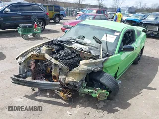 2013 Ford Mustang V6 with VIN 1ZVBP8AM1D5243147, listed as a IAAI auction lot 41975801 with Not provided miles and . Bid and sale history available at DreamBid. Image 2.