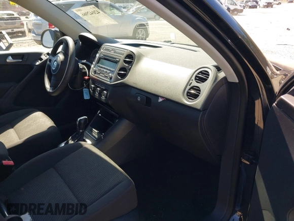 2012 Volkswagen Tiguan SEL with VIN WVGAV7AX4CW524596, listed as a IAAI auction lot 42042966 with 100,986 mi miles and . Bid and sale history available at DreamBid. Image 5.