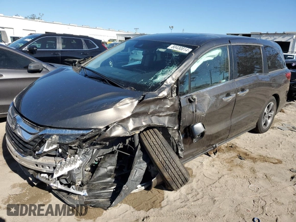 2020 Honda Odyssey Touring with VIN 5FNRL6H84LB012640, listed as a Copart auction lot 80430814 with 58,313 mi miles and Salvage Title. Bid and sale history available at DreamBid. Image 1.