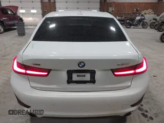 2020 BMW 3 Series 330i xDrive with VIN 3MW5R7J06L8B17690, listed as a IAAI auction lot 41659559 with 74,357 mi miles. Bid and sale history available at carsss.com. Image 16.