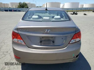 2012 Hyundai Accent GLS z VIN KMHCT4AE3CU197339, wystawiony jako Copart lot #55993685 z przebiegiem 218 401 mil mil oraz Szkody całkowita. Historia ofert i sprzedaży dostępna na DreamBid. Obrazek 6.