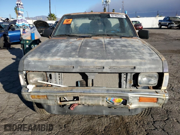 1991 Nissan Frontier z VIN 1N6SD11S2MC350332, wystawiony jako Copart lot #87462534 z przebiegiem 350 692 mil mil oraz Szkoda całkowita • Salvage title. Historia ofert i sprzedaży dostępna na DreamBid. Obrazek 5.