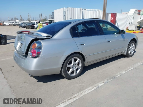 2002 Nissan Altima SE with VIN 1N4BL11E72C169164, listed as a IAAI auction lot 41992002 with 100,211 mi miles. Bid and sale history available at carsss.com. Image 4.