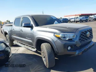 2021 Toyota Tacoma SR5 with VIN 3TMDZ5BN5MM109067, listed as a IAAI auction lot 37994259 with 27,654 mi miles and . Bid and sale history available at DreamBid. Image 1.