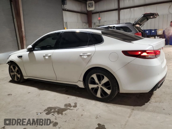 2016 Kia Optima SX Turbo with VIN 5XXGW4L27GG011734, listed as a Copart auction lot 45568905 with 142,900 mi miles and Salvage Title. Bid and sale history available at carsss.com. Image 2.