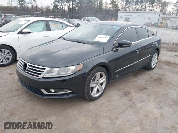 2013 Volkswagen CC Sport with VIN WVWAP7AN9DE526705, listed as a IAAI auction lot 41666264 with 145,841 mi miles. Bid and sale history available at carsss.com. Image 2.