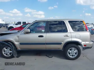 2000 Honda CR-V SE with VIN JHLRD1873YC039813, listed as a IAAI auction lot 40716079 with 214,067 mi miles. Bid and sale history available at carsss.com. Image 15.