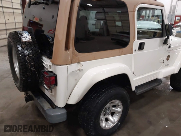 1997 Jeep Wrangler Sahara with VIN 1J4FY49S3VP529837, listed as a IAAI auction lot 41752978 with 138,024 mi miles. Bid and sale history available at carsss.com. Image 6.