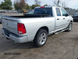 2014 Ram 1500 Express z VIN 1C6RR7FTXES136971, wystawiony jako IAAI lot #41845334 z przebiegiem 94 893 mil mil oraz . Historia ofert i sprzedaży dostępna na DreamBid. Obrazek 4.