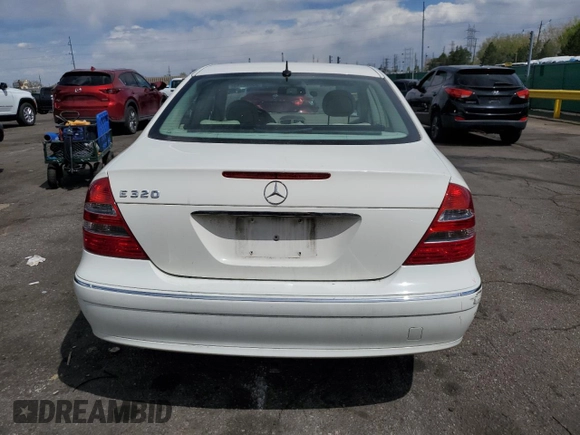 2004 Mercedes-Benz E 320 with VIN WDBUF65J94A412257, listed as a Copart auction lot 53062145 with 140,891 mi miles and Salvage Title. Bid and sale history available at carsss.com. Image 6.