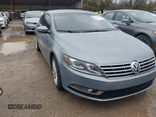 2013 Volkswagen CC Sport with VIN WVWBN7AN7DE503417, listed as a IAAI auction lot 41205584 with 185,437 mi miles and . Bid and sale history available at DreamBid. Image 1.