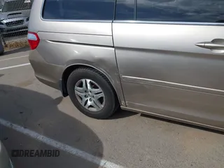 2005 Honda Odyssey EX-L z VIN 5FNRL38615B407908, wystawiony jako IAAI lot #42076045 z przebiegiem 170 950 mil mil oraz . Historia ofert i sprzedaży dostępna na DreamBid. Obrazek 13.