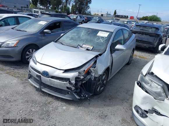 2022 Toyota Prius L Eco with VIN JTDKAMFU0N3181467, listed as a IAAI auction lot 41802679 with 121,749 mi miles. Bid and sale history available at carsss.com. Image 22.