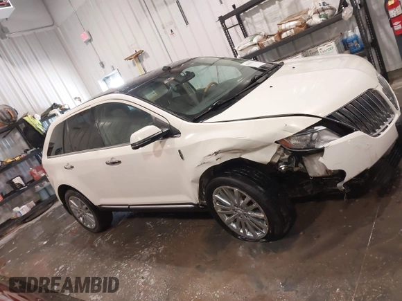 2013 Lincoln MKX with VIN 2LMDJ8JK4DBL60499, listed as a IAAI auction lot 41816339 with 132,061 mi miles. Bid and sale history available at carsss.com. Image 14.