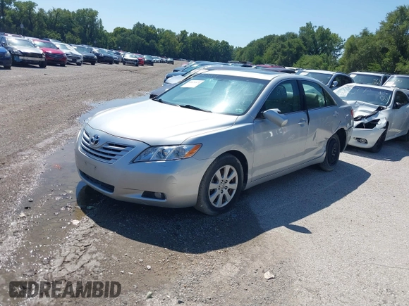 2007 Toyota Camry LE with VIN 4T1BK46K47U500034, listed as a IAAI auction lot 40120574 with 137,418 mi miles and . Bid and sale history available at DreamBid. Image 2.
