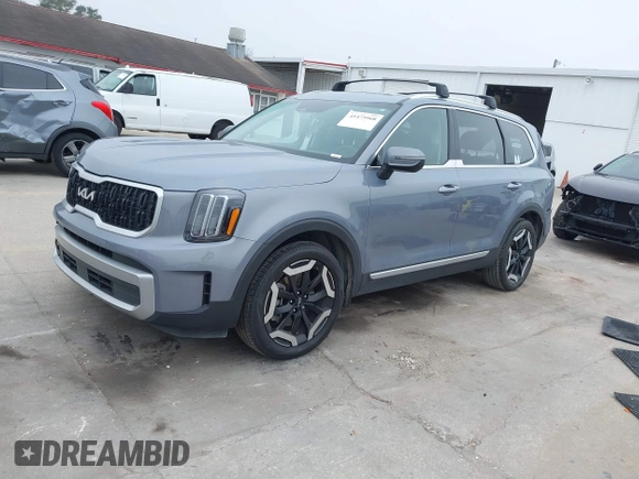 2023 Kia Telluride EX with VIN 5XYP34GC7PG356057, listed as a IAAI auction lot 41475968 with 37,832 mi miles and . Bid and sale history available at DreamBid. Image 2.
