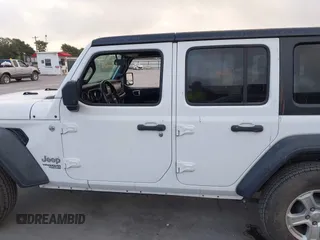 2019 Jeep Wrangler Unlimited Sport S with VIN 1C4HJXDG2KW500662, listed as a IAAI auction lot 42571152 with 45,067 mi miles and . Bid and sale history available at DreamBid. Image 14.