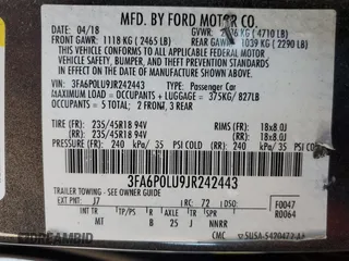 2018 Ford Fusion SE z VIN 3FA6P0LU9JR242443, wystawiony jako Copart lot #58049355 z przebiegiem 123 990 mil mil oraz Szkoda całkowita • Salvage title. Historia ofert i sprzedaży dostępna na DreamBid. Obrazek 13.