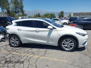 2018 Infiniti QX30 Premium z VIN SJKCH5CP5JA006199, wystawiony jako IAAI lot #42673215 z przebiegiem 107 294 mil mil oraz . Historia ofert i sprzedaży dostępna na DreamBid. Obrazek 14.