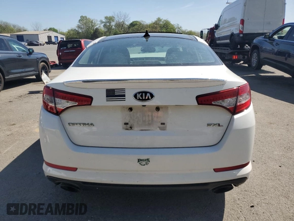 2013 Kia Optima SX z VIN 5XXGR4A63DG100161, wystawiony jako Copart lot #55036865 z przebiegiem Nie podano mil oraz Szkoda całkowita • Salvage title. Historia ofert i sprzedaży dostępna na DreamBid. Obrazek 6.