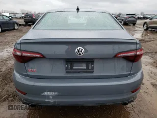 2021 Volkswagen Jetta GLI S z VIN 3VW6T7BU1MM017433, wystawiony jako Copart lot #73349822 z przebiegiem 7188 mil mil oraz . Historia ofert i sprzedaży dostępna na DreamBid. Obrazek 6.