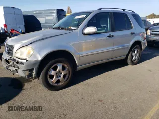 2002 Mercedes-Benz M-Class with VIN 4JGAB54E62A297849, listed as a Copart auction lot 83912114 with 240,479 mi miles and Salvage Title. Bid and sale history available at carsss.com. Image 1.