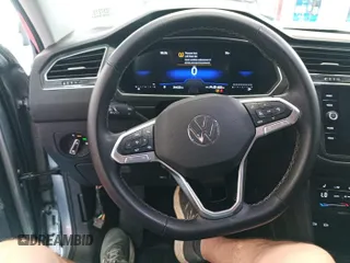 2024 Volkswagen Tiguan SE with VIN 3VV3B7AX8RM108454, listed as a IAAI auction lot 42793135 with 34,423 mi miles and . Bid and sale history available at DreamBid. Image 28.