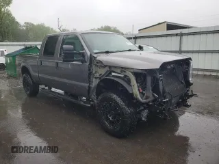 2014 Ford F-250 XL with VIN 1FT7W2B60EEA33908, listed as a Copart auction lot 54752765 with 215,428 mi miles and Salvage title. Bid and sale history available at DreamBid. Image 4.