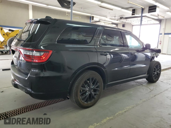 2015 Dodge Durango R/T with VIN 1C4SDJCTXFC817802, listed as a Copart auction lot 61962865 with 146,826 mi miles and Salvage title. Bid and sale history available at DreamBid. Image 3.