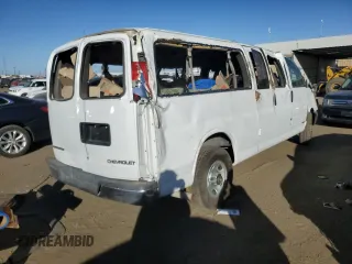 2005 Chevrolet Express Passenger with VIN 1GAHG39U851234497, listed as a Copart auction lot 77631364 with 173,891 mi miles and Salvage title. Bid and sale history available at DreamBid. Image 3.